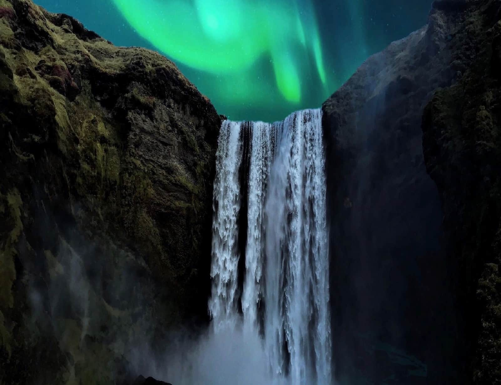 The Skogafoss waterfall in Iceland under the Northern Lights